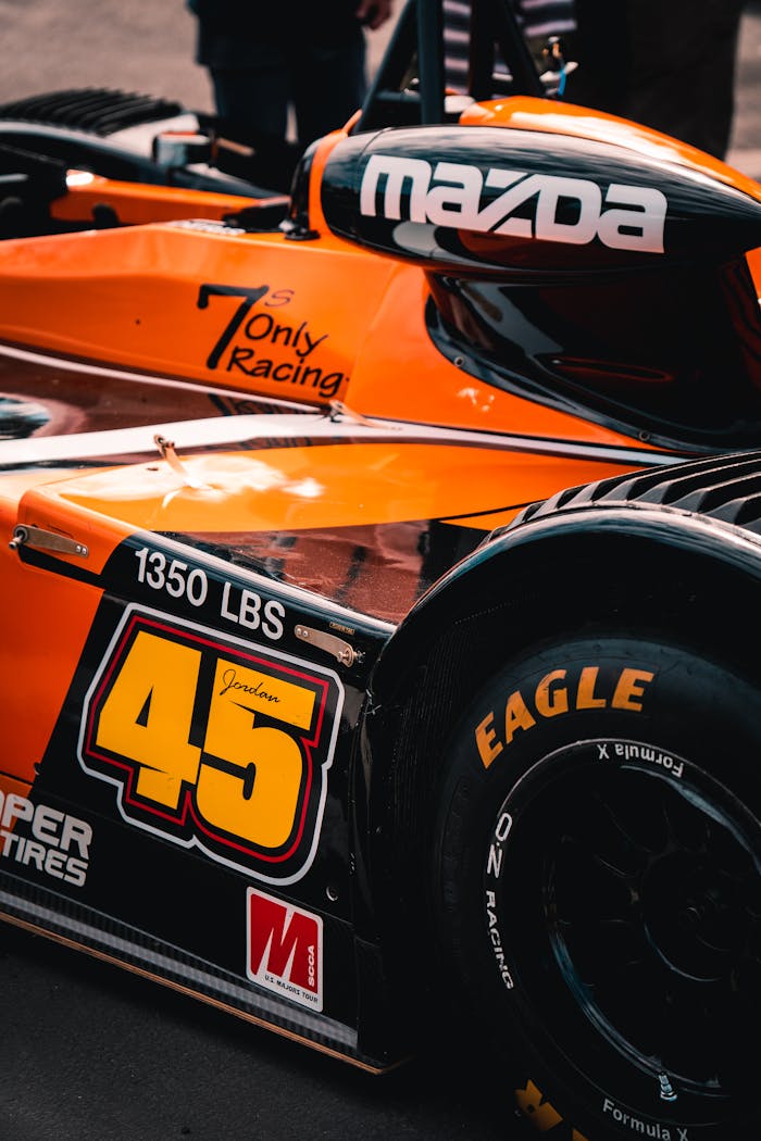 An Orange and Black Race Car